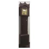 Antique tall case clock with engraved brass dial