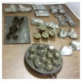 Group of assorted ice cream molds, scale weights,