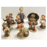 9 assorted Hummels including West Germany