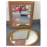 2 ornately framed mirrors