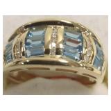 10K gold ring set with blue topaz & side diamonds