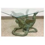 24" long bronze cupid with glass top