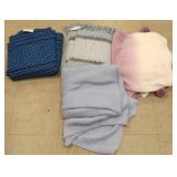 4 assorted throws with tags