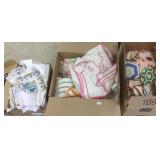 Group vintage hankies, aprons, crocheted hot pads,