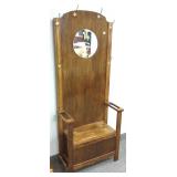 Oak hall tree with lift top bench
