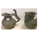 2- 7 1/2" bronze pitchers with figural handles