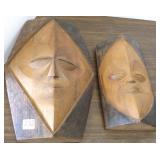 2 carved wood David Crear face plaques