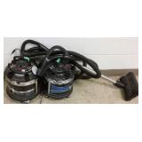 2 Filter Queen vacuums with accessories