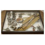 Display case with pre-level wind reels, south bend