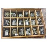 Case with 18 vintage fishing reels