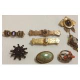 7 Victorian etc. brooches including garnet & 1