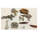 9 assorted vintage brooches including signed