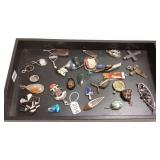 Group 28 assorted pendants including signed