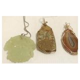 Approx. 2 1/2" carved jade pendant & 2 large stone
