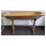 65" carved wooden trough on stand
