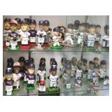 Large collection of Twins bobbleheads including