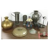 10 vintage metal items including doorstops, lawn
