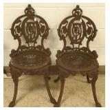 2 ornate iron garden chairs