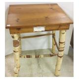 Rustic birch leg table with Birch Point Lodge tag