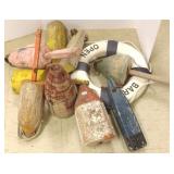 Group of wooden floats & a life saver