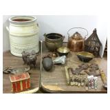 Group including copper, stoneware piece, iron pig,