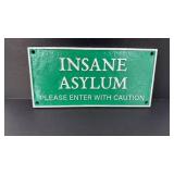 CAST IRON INSANE ASYLUM SIGN