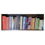 SHELF OF RELIGIOUS BOOKS