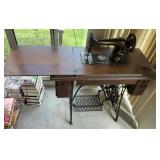 ANTIQUE TREADLE SEWING MACHINE W/ CABINET