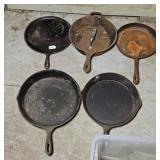 (4) CAST IRON SKILLETS & GRIDDLE