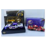 (2) ACTION 1:24 DIECAST CARS