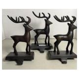 (3) CAST IRON STOCKING HOLDERS
