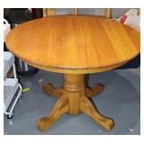 OAK PEDESTAL DINING TABLE