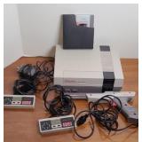NINTENDO NES W/ (2) CONTROLLERS & ZAPPER