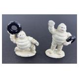 (2) MICHELIN MAN CAST IRON PAPERWEIGHTS