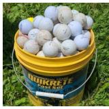 BUCKET OF GOLF BALLS