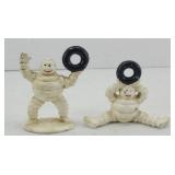 (2) MICHELIN MAN CAST IRON PAPERWEIGHTS