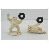 (2) MICHELIN MAN CAST IRON PAPERWEIGHTS