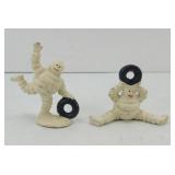 (2) MICHELIN MAN CAST IRON PAPERWEIGHTS