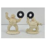 (2) MICHELIN MAN CAST IRON PAPERWEIGHTS