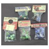 (5) BAGS OF MARBLES