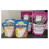 (2) BAGS OF PLANT FOOD, (5) BAGS OF WATER