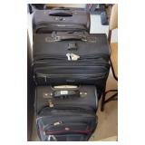 (3) SUITCASES
