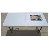 LIFETIME 4FT FOLD IN HALF TABLE