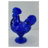COBALT BLUE ROOSTER ON NEST