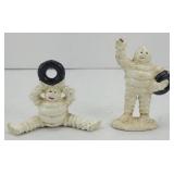 (2) MICHELIN MAN CAST IRON PAPERWEIGHTS