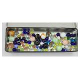 TIN OF MARBLES