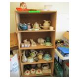 Contents of Shelves: Teapots, Plates, Bowls,