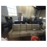 Grey Cloth Couch with Cup Holders