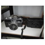 Olympus, Argus and Canon Cameras