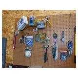 Tools on Peg Board: Grinding Discs, Saws, Bolt
